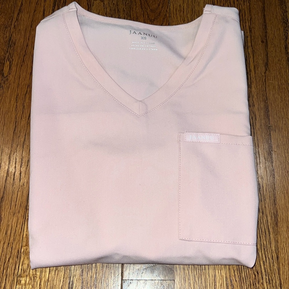 Brand new jaanuu baby pink scrub top